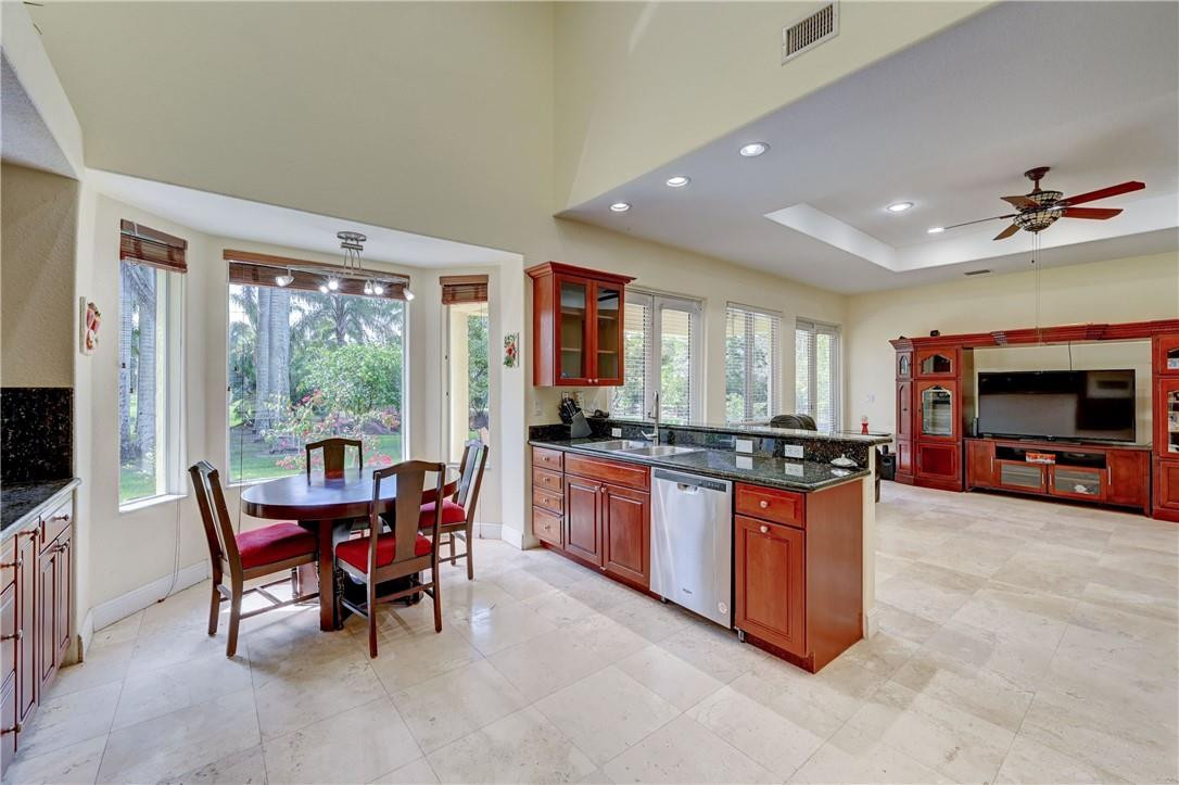 17400 Southwest 66th Street Southwest Ranches, FL 33331 - Photo 5 of 38 a view of a dining room with furniture window and outside view