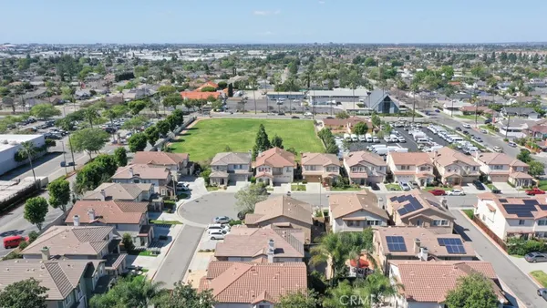 an aerial view of a city with lots of residential buildings