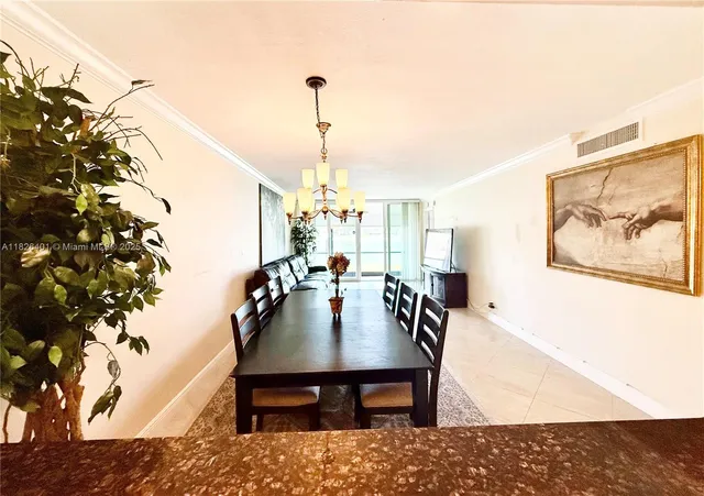 a view of a living room and dining room