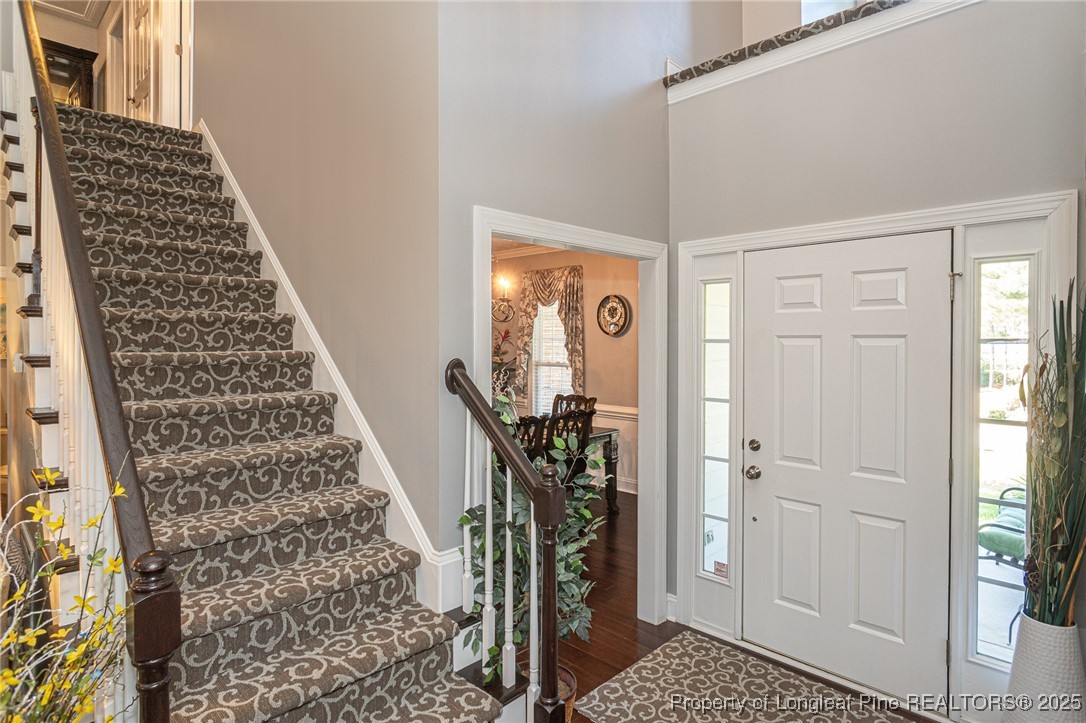 595 Whispering Pines Drive Spring Lake, NC 28390 - Photo 26 of 48 a view of a hallway view with staircase