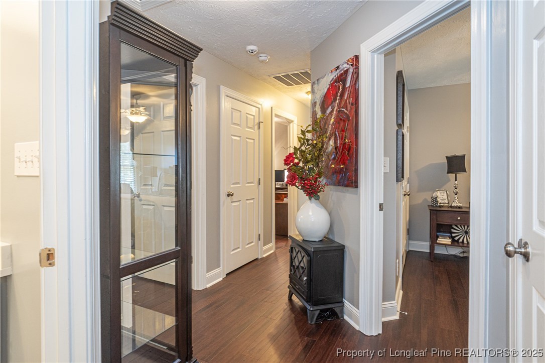 595 Whispering Pines Drive Spring Lake, NC 28390 - Photo 27 of 48 a view of living room and wooden floor