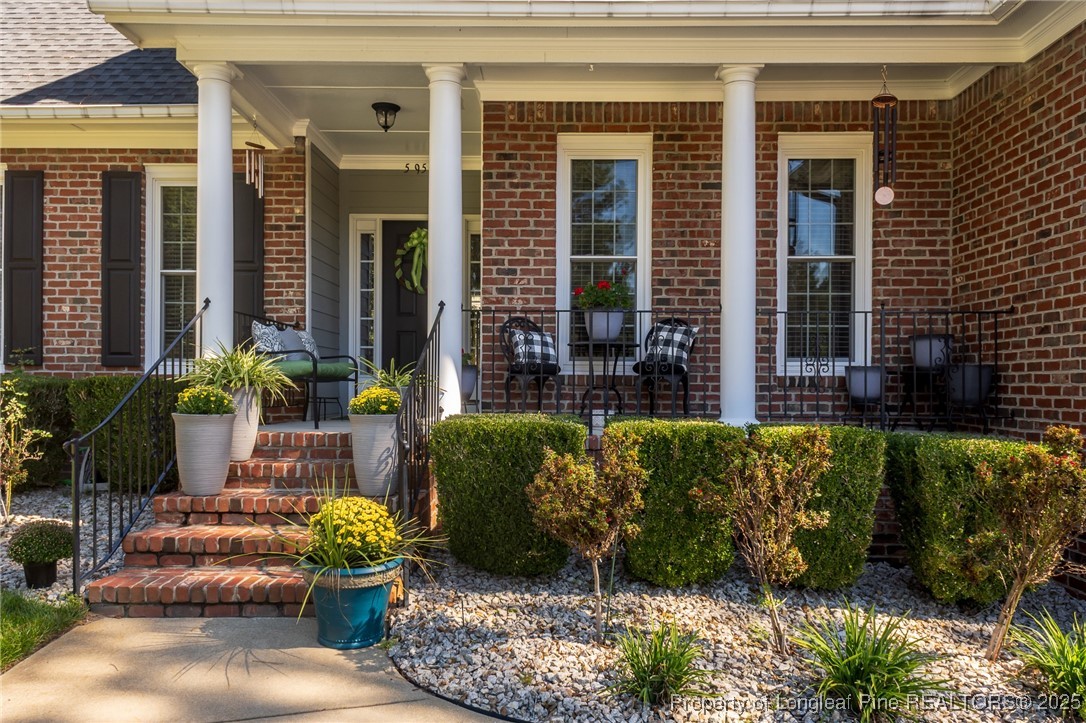 595 Whispering Pines Drive Spring Lake, NC 28390 - Photo 39 of 48 a view of a chairs in front of a house