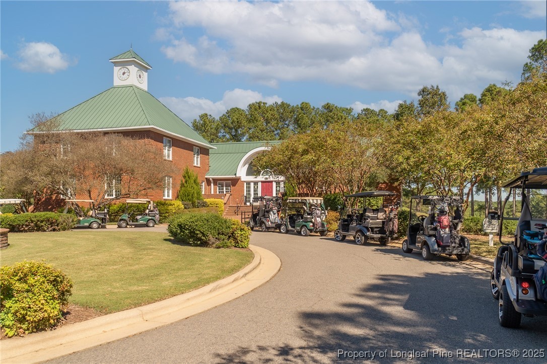 595 Whispering Pines Drive Spring Lake, NC 28390 - Photo 43 of 48 a view of a city with tall buildings