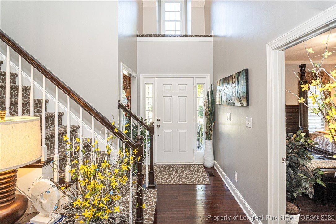 595 Whispering Pines Drive Spring Lake, NC 28390 - Photo 6 of 48 a view of an entryway with wooden floor