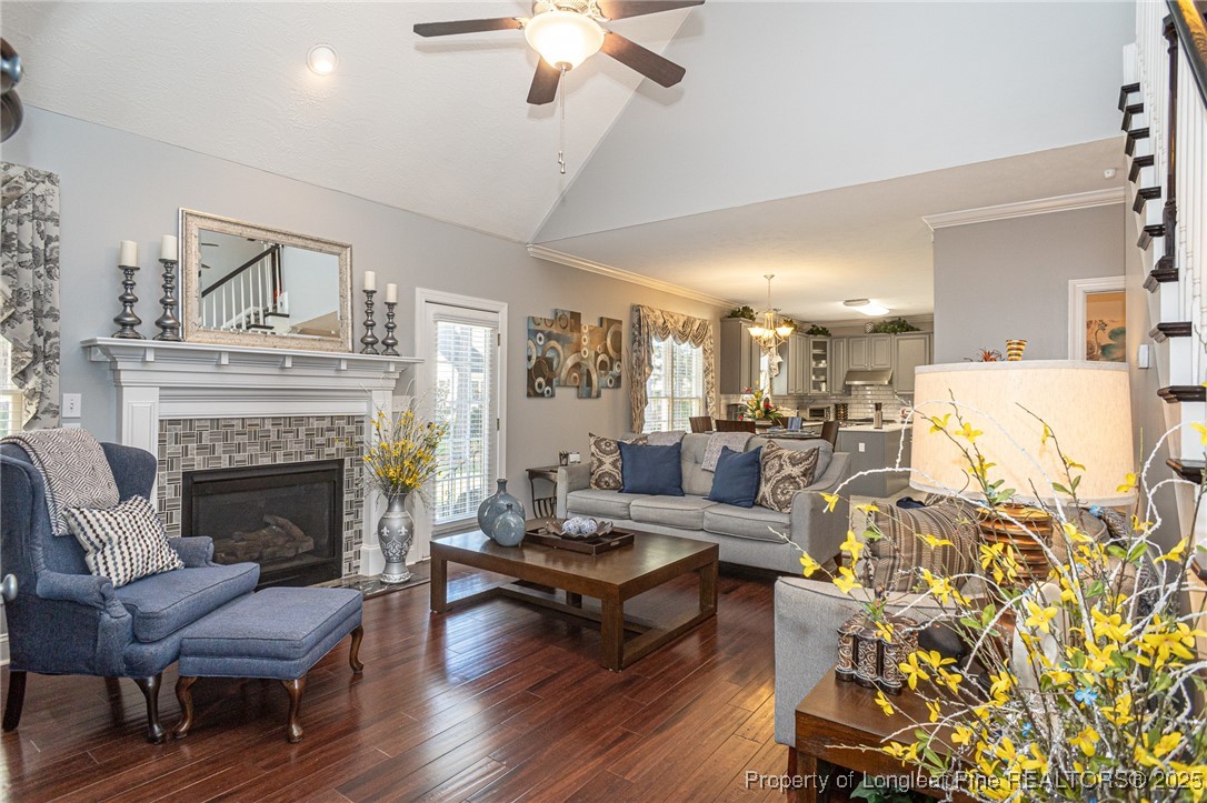 595 Whispering Pines Drive Spring Lake, NC 28390 - Photo 8 of 48 a living room with furniture and a fireplace