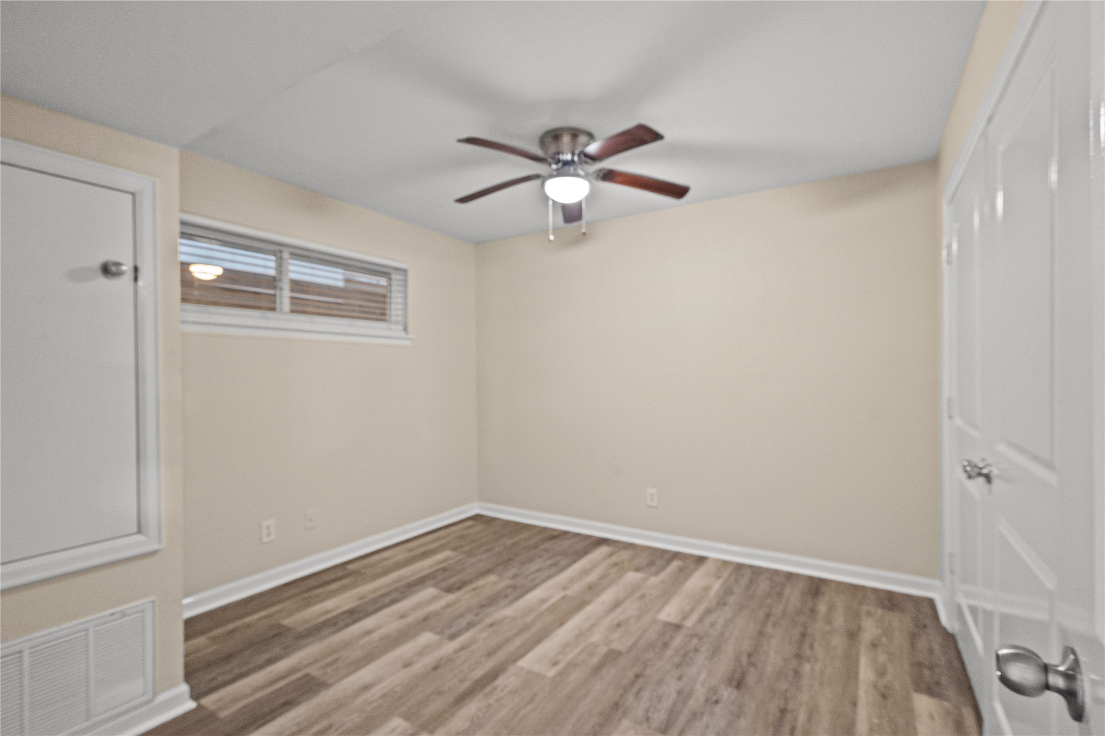 102 Strand Street, Unit 3 Galveston, TX 77550 - Photo 12 of 19 wooden floor in an empty room