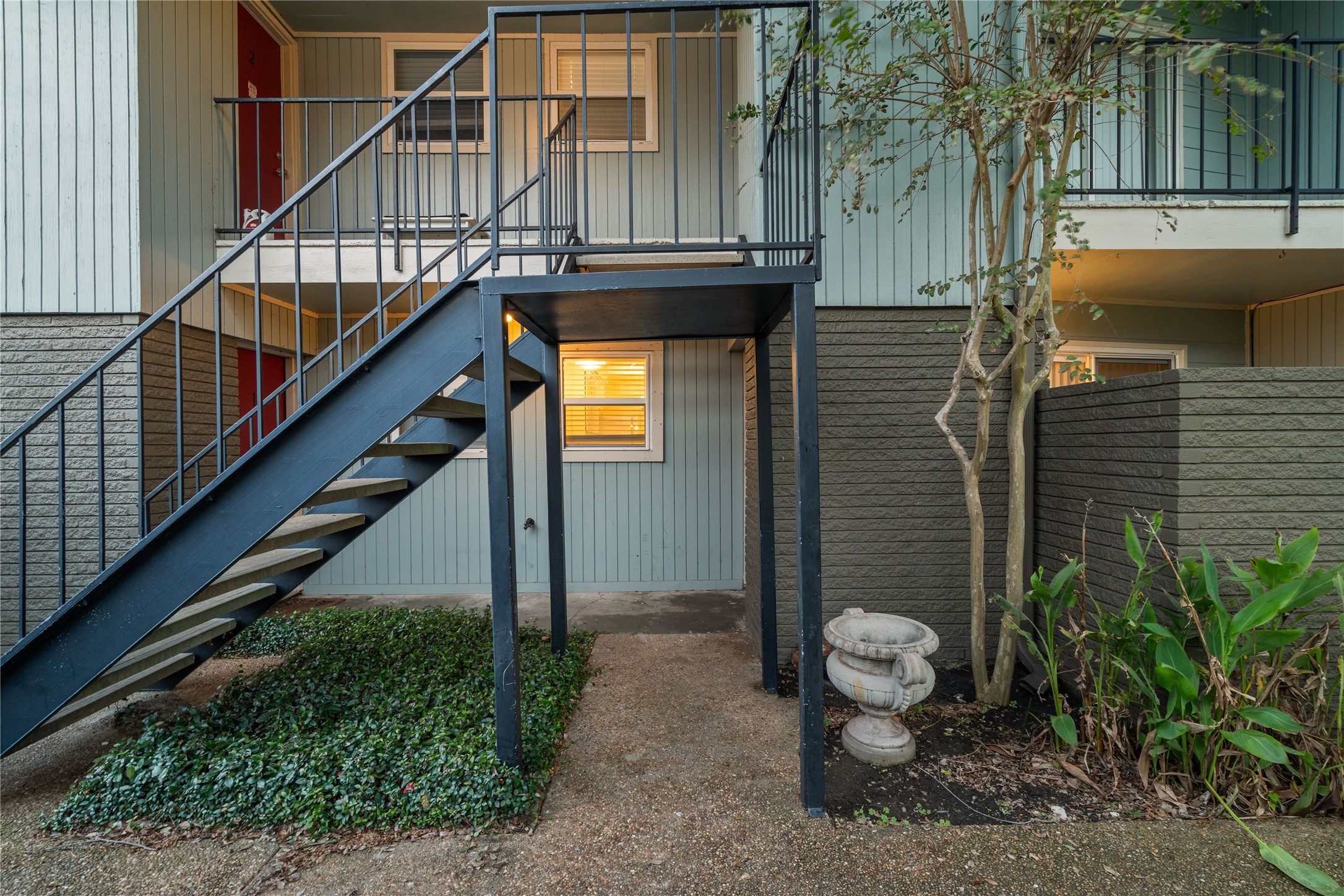 102 Strand Street, Unit 3 Galveston, TX 77550 - Photo 18 of 19 a view of a house with backyard and sitting area