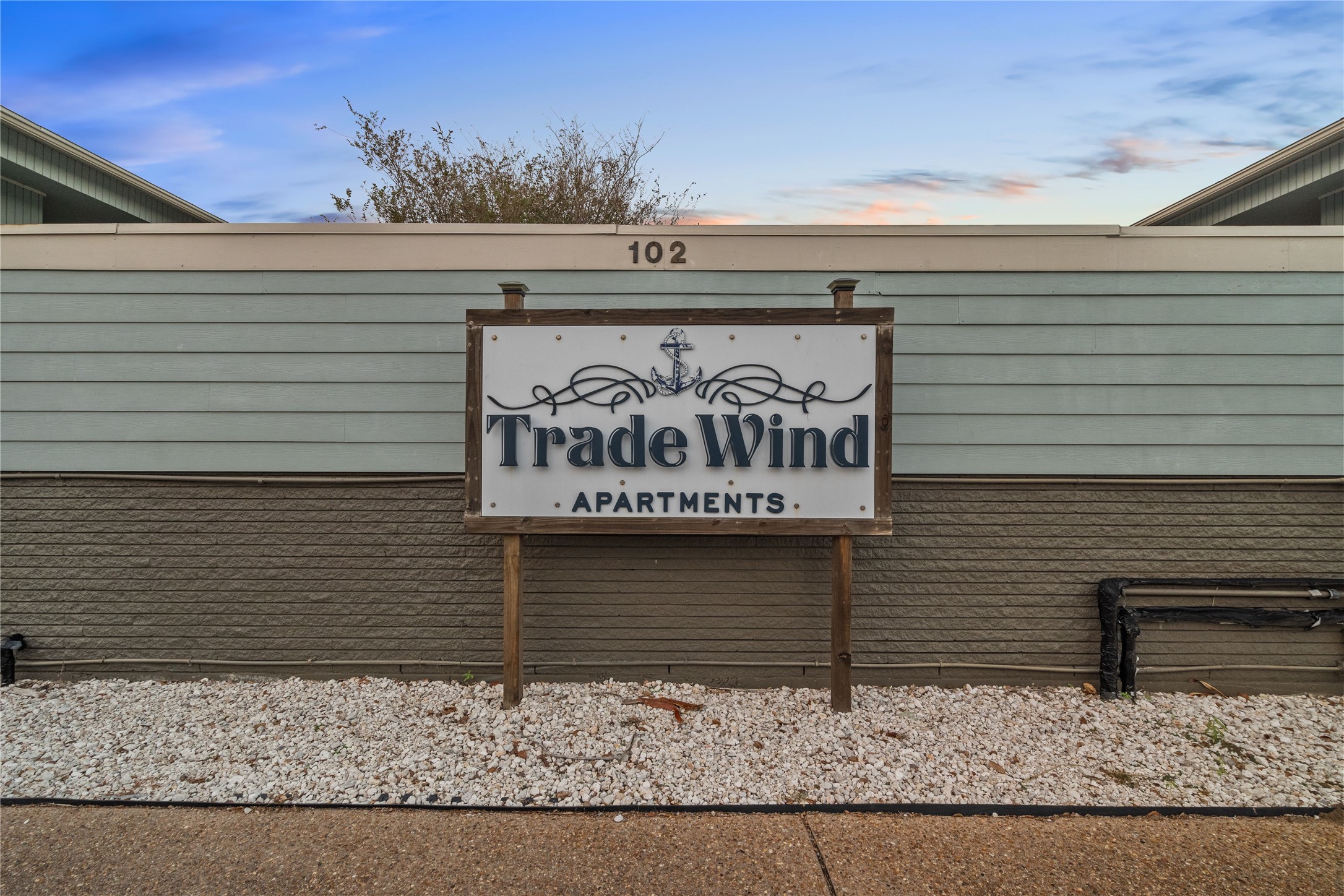 102 Strand Street, Unit 3 Galveston, TX 77550 - Photo 19 of 19 a sign that is on the side of a building