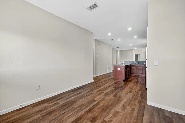 a view of a kitchen with a sink and a microwave