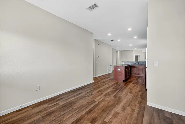 a view of a kitchen with a sink and a microwave
