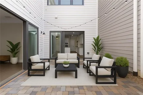 a building outdoor space with patio furniture