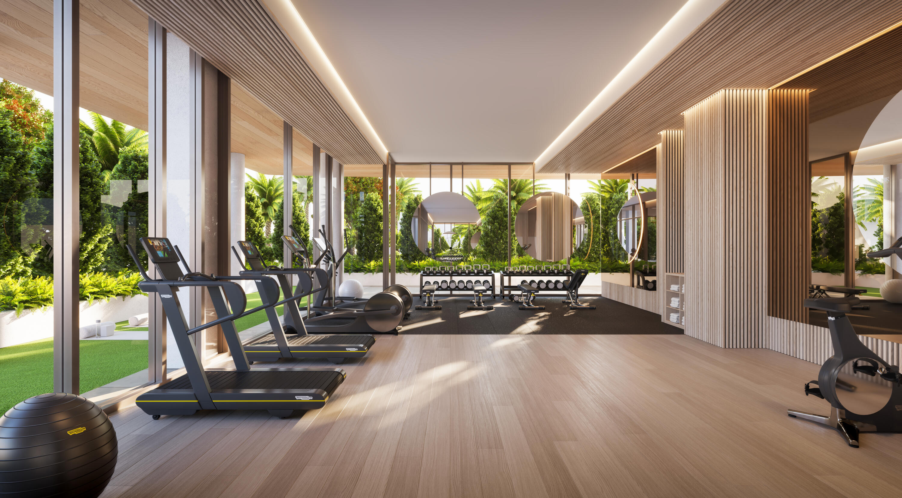 280 East Palmetto Park Road, Unit 73 Boca Raton, FL 33432 - Photo 4 of 11 a view of a room with gym equipment and floor to ceiling windows