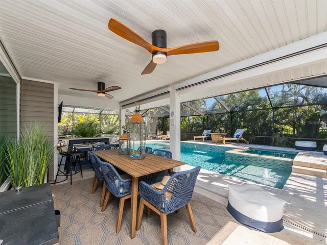 a kitchen with stainless steel appliances granite countertop wooden cabinets a sink and a stove