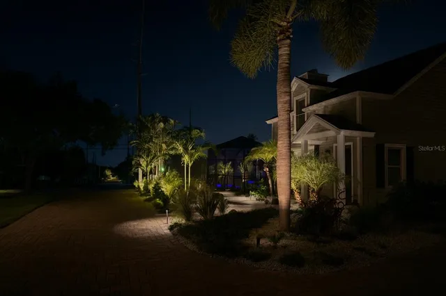 a bed room with a bed and a television