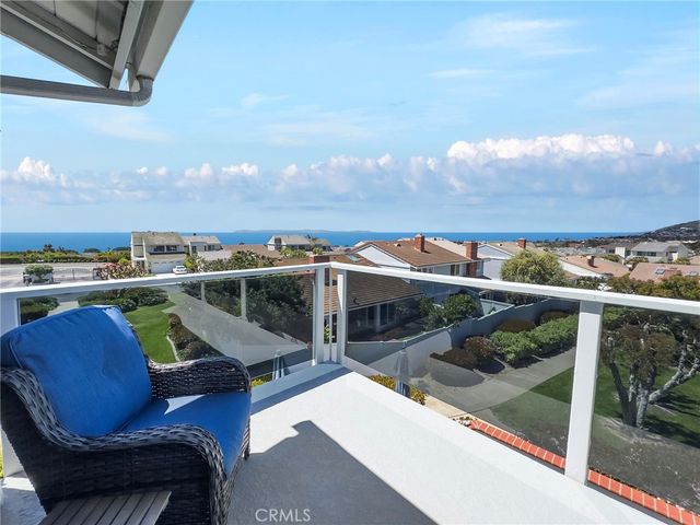 a view of roof deck with seating space