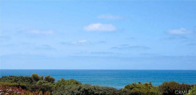 a view of ocean with beach
