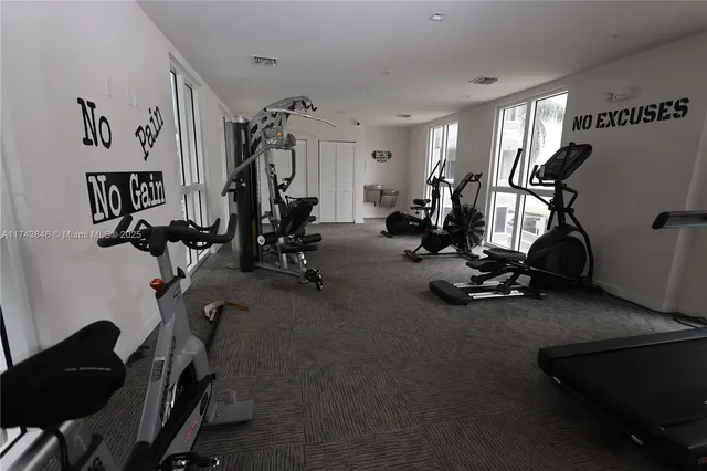 a view of a room with gym equipment