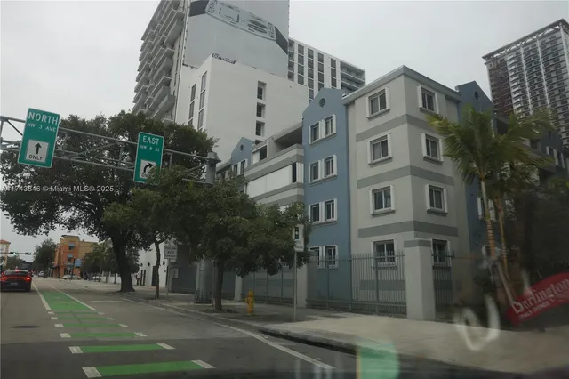 a view of balcony and yard