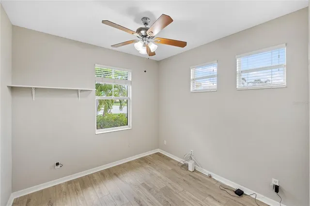 a potted plant sitting in front of a door