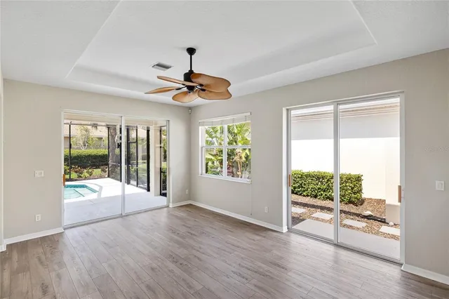 a view of an entryway with wooden floor