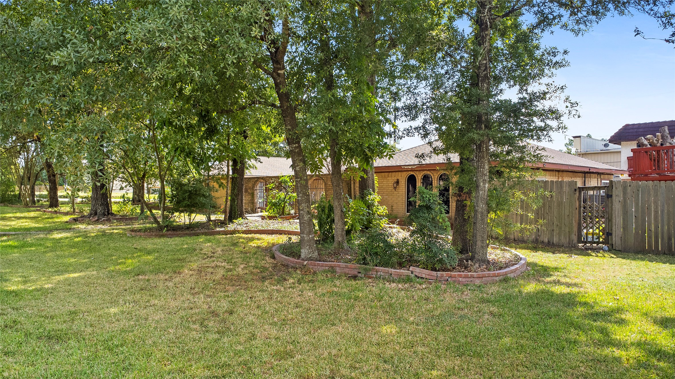 186 Spring Pines Drive Spring, TX 77386 - Photo 3 of 9 a view of a house with a yard and tree s