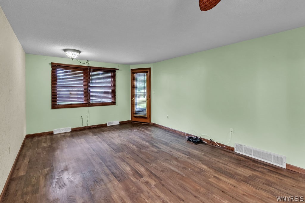 4755 Chestnut Ridge Road, Unit 9 Amherst, NY 14228 - Photo 26 of 46 Living room area with door to rear deck
