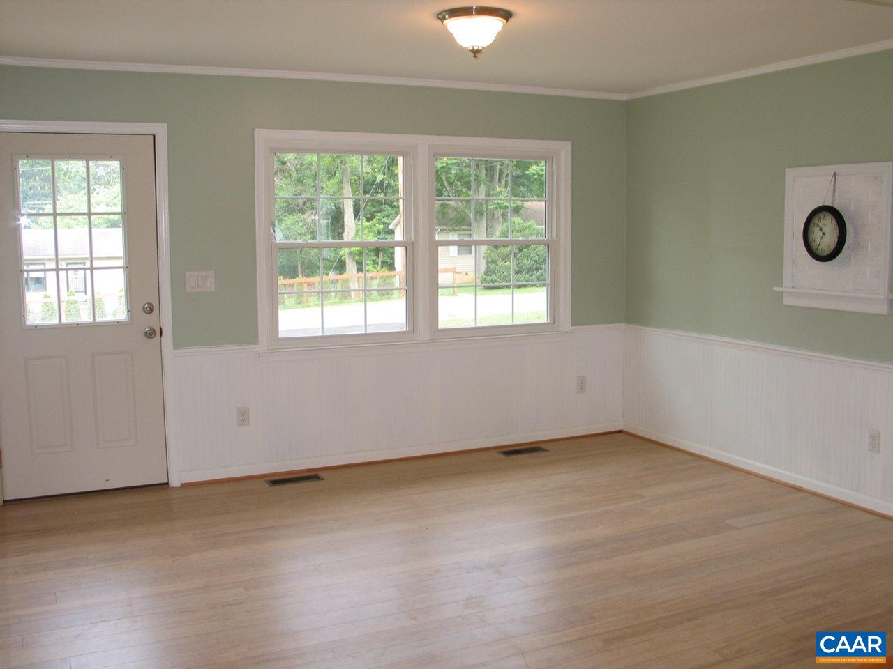 45 Holmes Run Road Stanardsville, VA 22973 - Photo 2 of 17 an empty room with a empty space and windows
