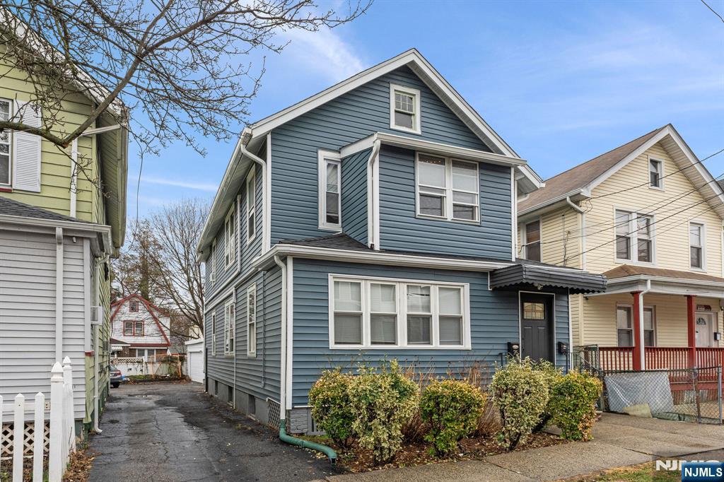 76 Mission Street Montclair, NJ 07042 - Photo 2 of 50 a front view of a house with garden