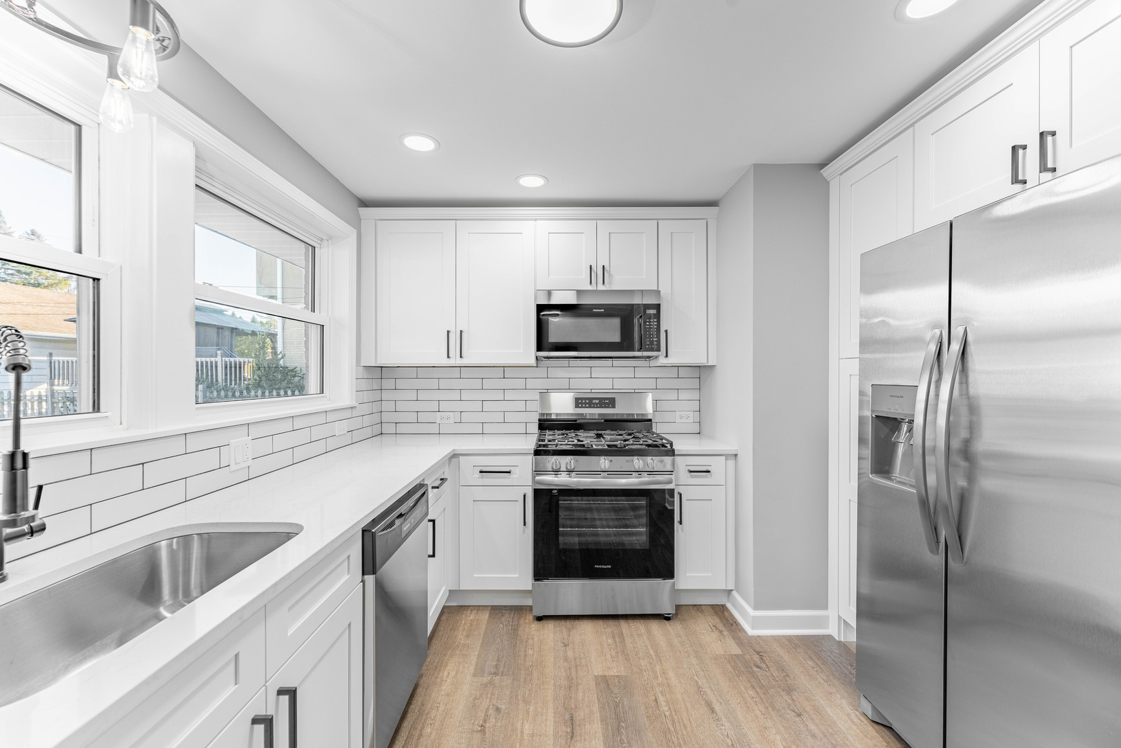 3615 Raymond Avenue Brookfield, IL 60513 - Photo 14 of 49 a kitchen with a sink stainless steel appliances and cabinets