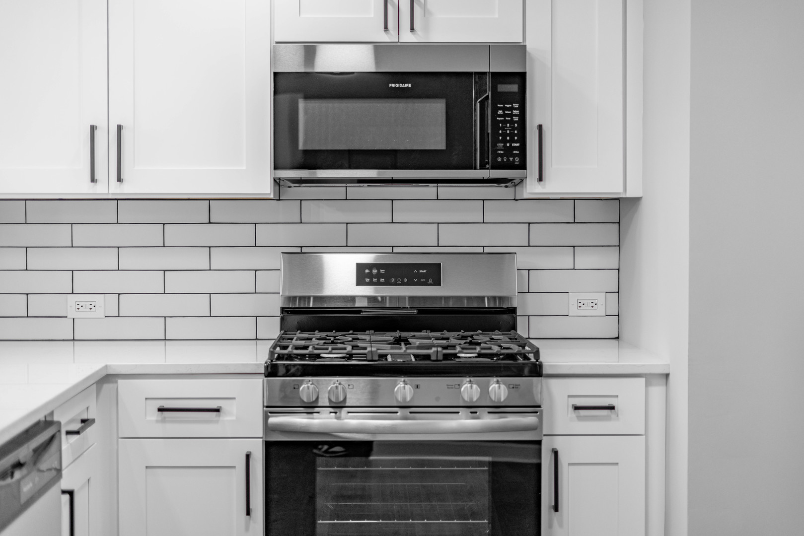 3615 Raymond Avenue Brookfield, IL 60513 - Photo 16 of 49 a kitchen with microwave cabinets and stove top oven