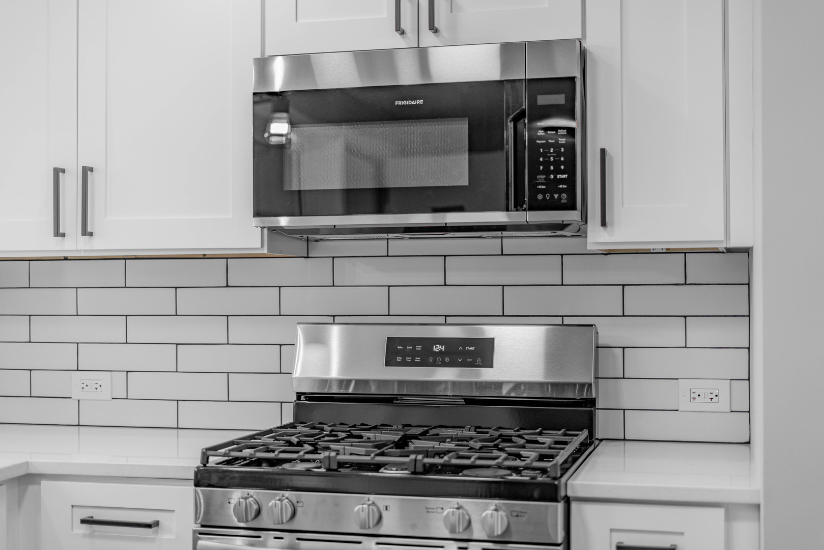 3615 Raymond Avenue Brookfield, IL 60513 - Photo 17 of 49 a stove top oven sitting inside of a kitchen