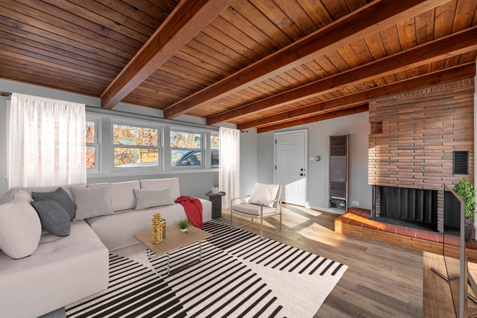3615 Raymond Avenue Brookfield, IL 60513 - Photo 23 of 49 a living room with furniture a rug and a chandelier