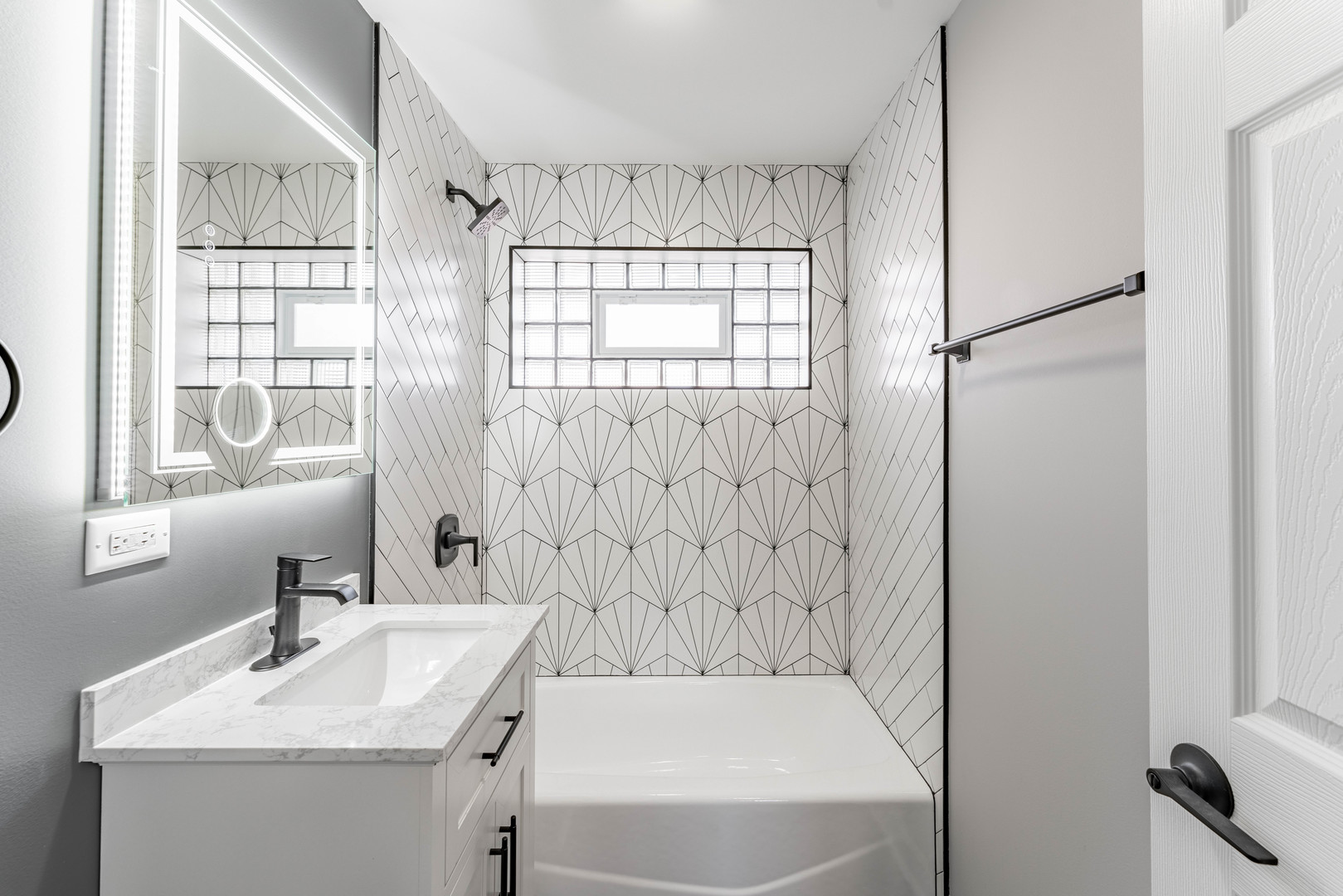 3615 Raymond Avenue Brookfield, IL 60513 - Photo 27 of 49 a bathroom with a sink a toilet and shower