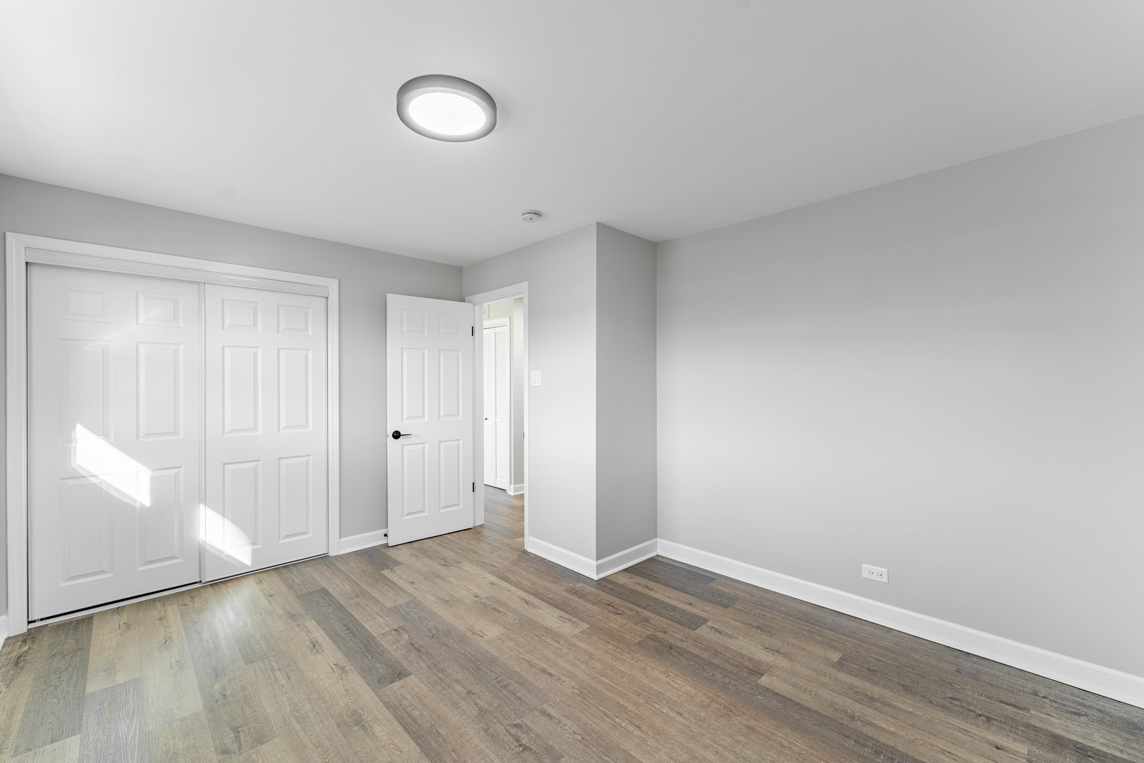 3615 Raymond Avenue Brookfield, IL 60513 - Photo 28 of 49 a view of an empty room with wooden floor