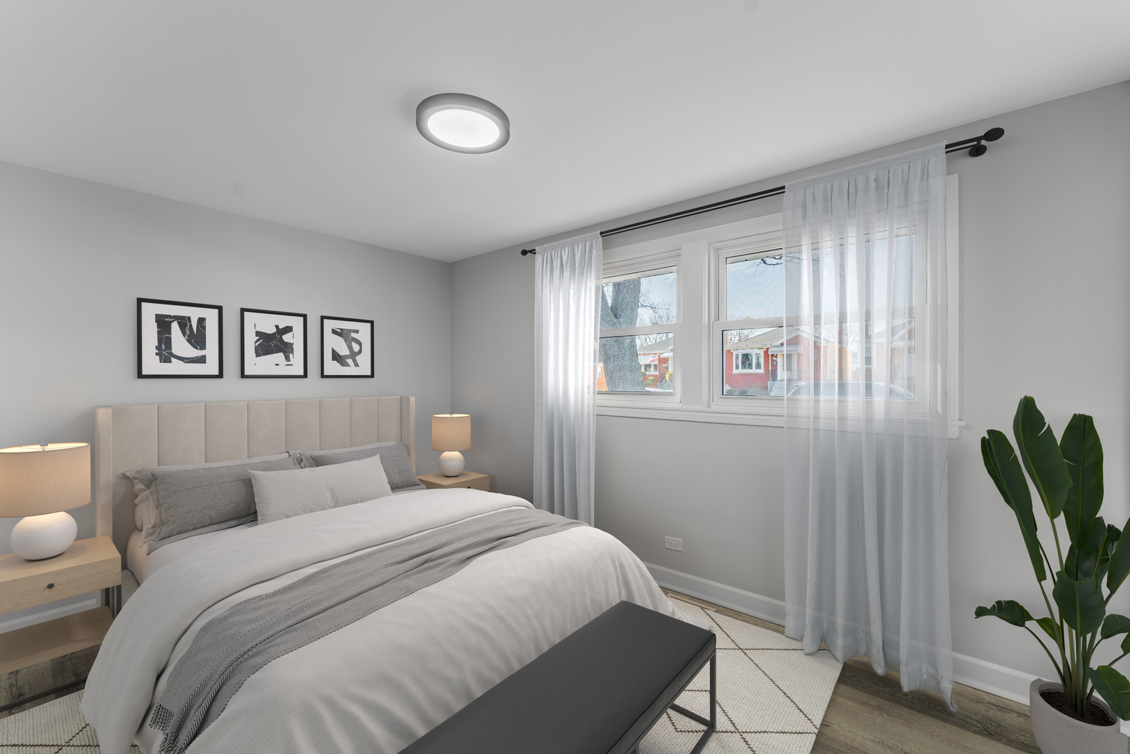 3615 Raymond Avenue Brookfield, IL 60513 - Photo 30 of 49 a bedroom with a bed and a potted plant