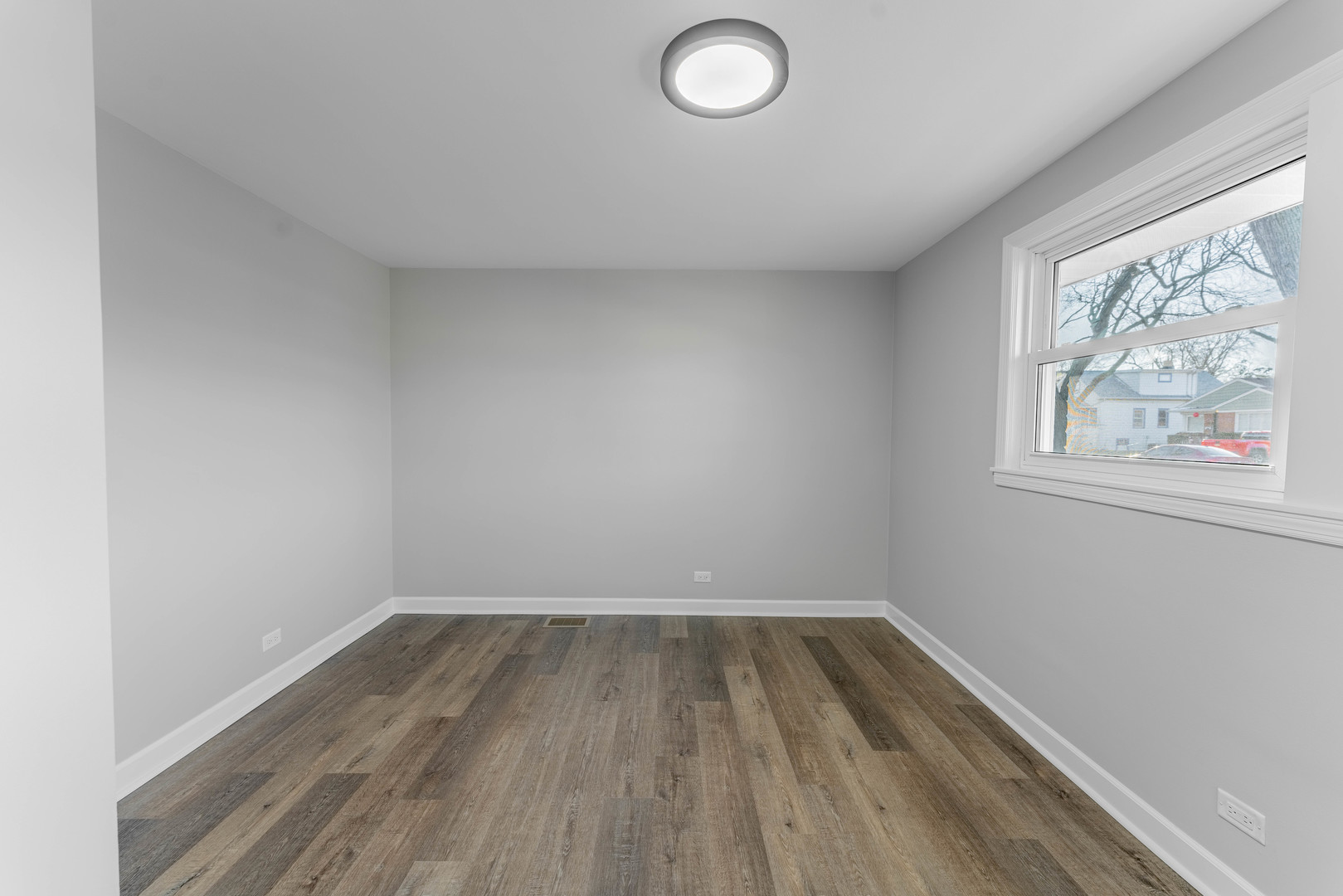 3615 Raymond Avenue Brookfield, IL 60513 - Photo 33 of 49 a view of room with window and wooden floor
