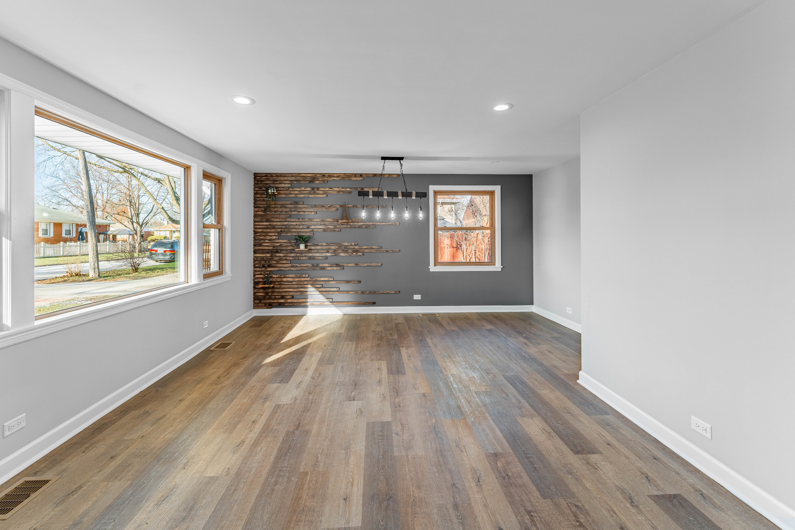 3615 Raymond Avenue Brookfield, IL 60513 - Photo 9 of 49 wooden floor in an empty room with a window