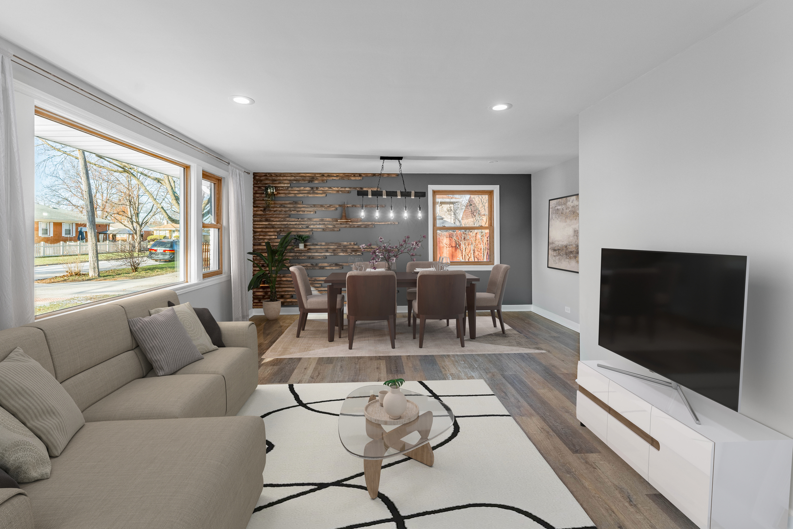 3615 Raymond Avenue Brookfield, IL 60513 - Photo 10 of 49 a living room with furniture and a flat screen tv