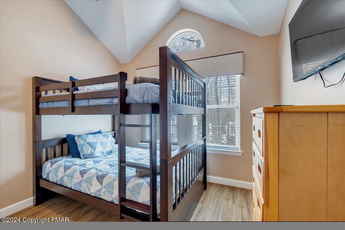 12 Beechwood Road Lake Harmony, PA 18624 - Photo 26 of 45 a bedroom with a bed and a window
