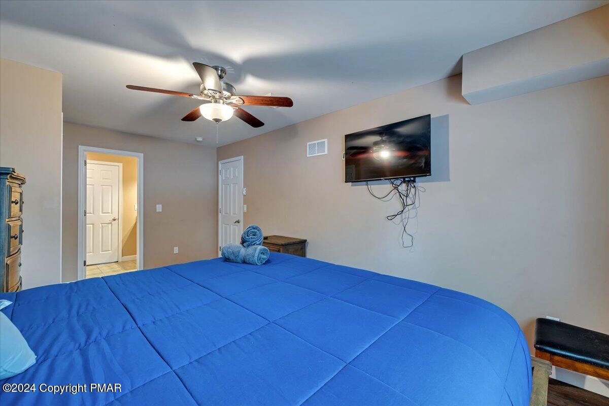 12 Beechwood Road Lake Harmony, PA 18624 - Photo 33 of 45 a view of a livingroom with furniture and chandelier fan