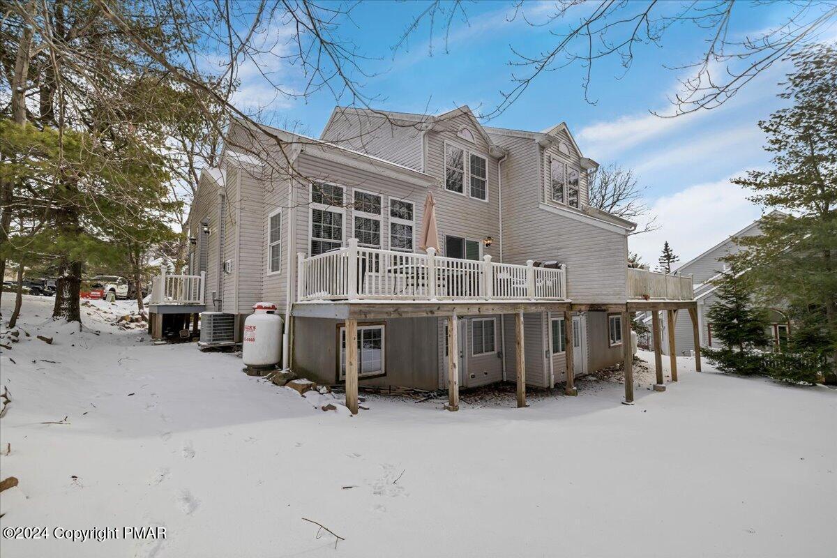 12 Beechwood Road Lake Harmony, PA 18624 - Photo 4 of 45 a view of a house with a yard covered in snow