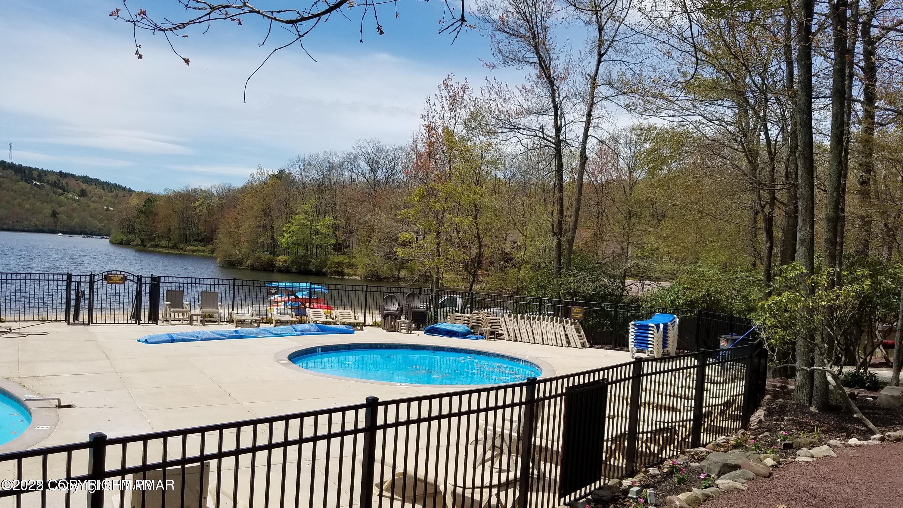 12 Beechwood Road Lake Harmony, PA 18624 - Photo 43 of 45 a view of a swimming pool with a patio