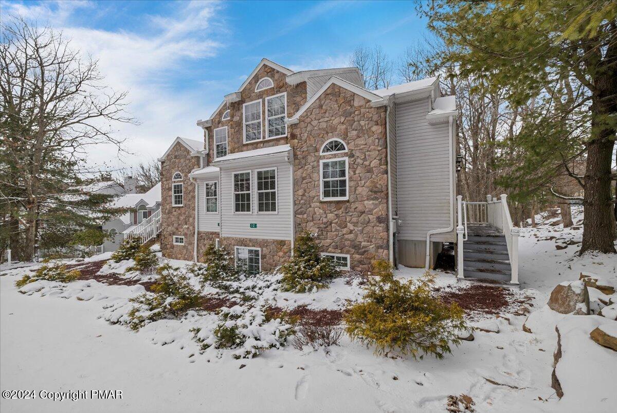12 Beechwood Road Lake Harmony, PA 18624 - Photo 5 of 45 a front view of a house with a yard