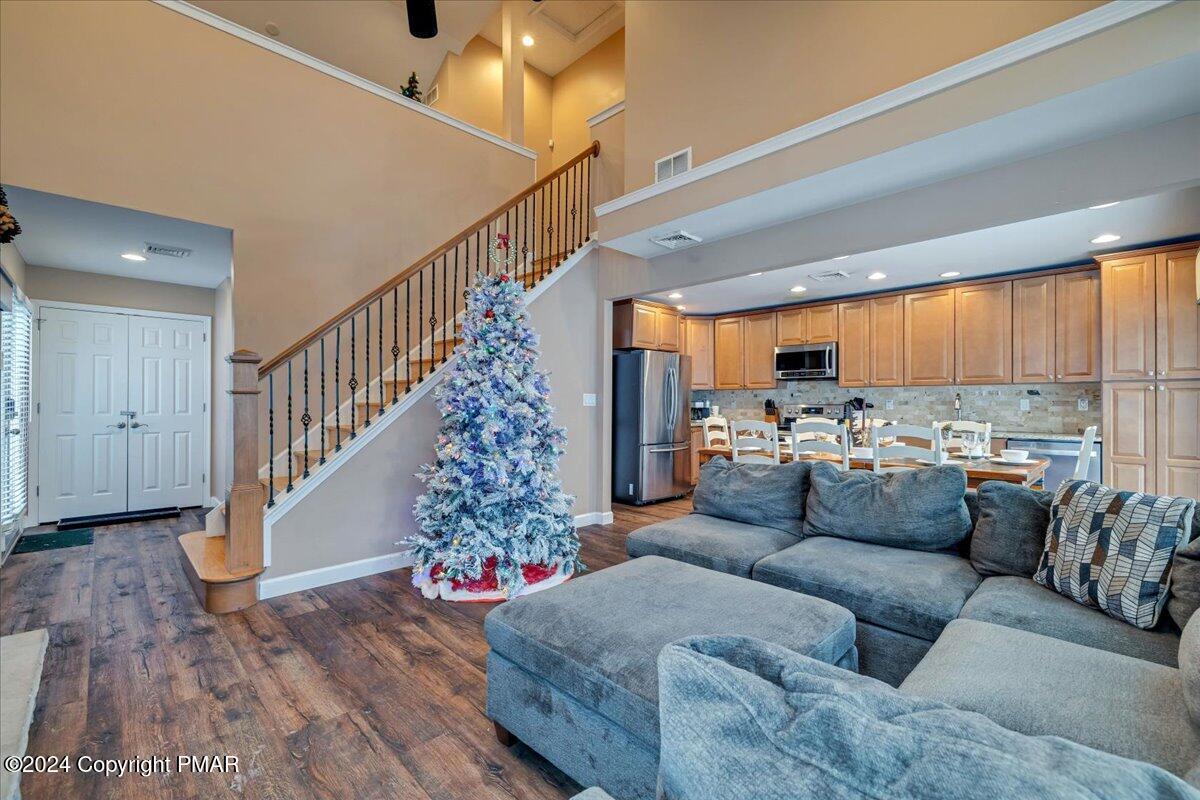 12 Beechwood Road Lake Harmony, PA 18624 - Photo 8 of 45 a living room with furniture or stairs and a wooden floor