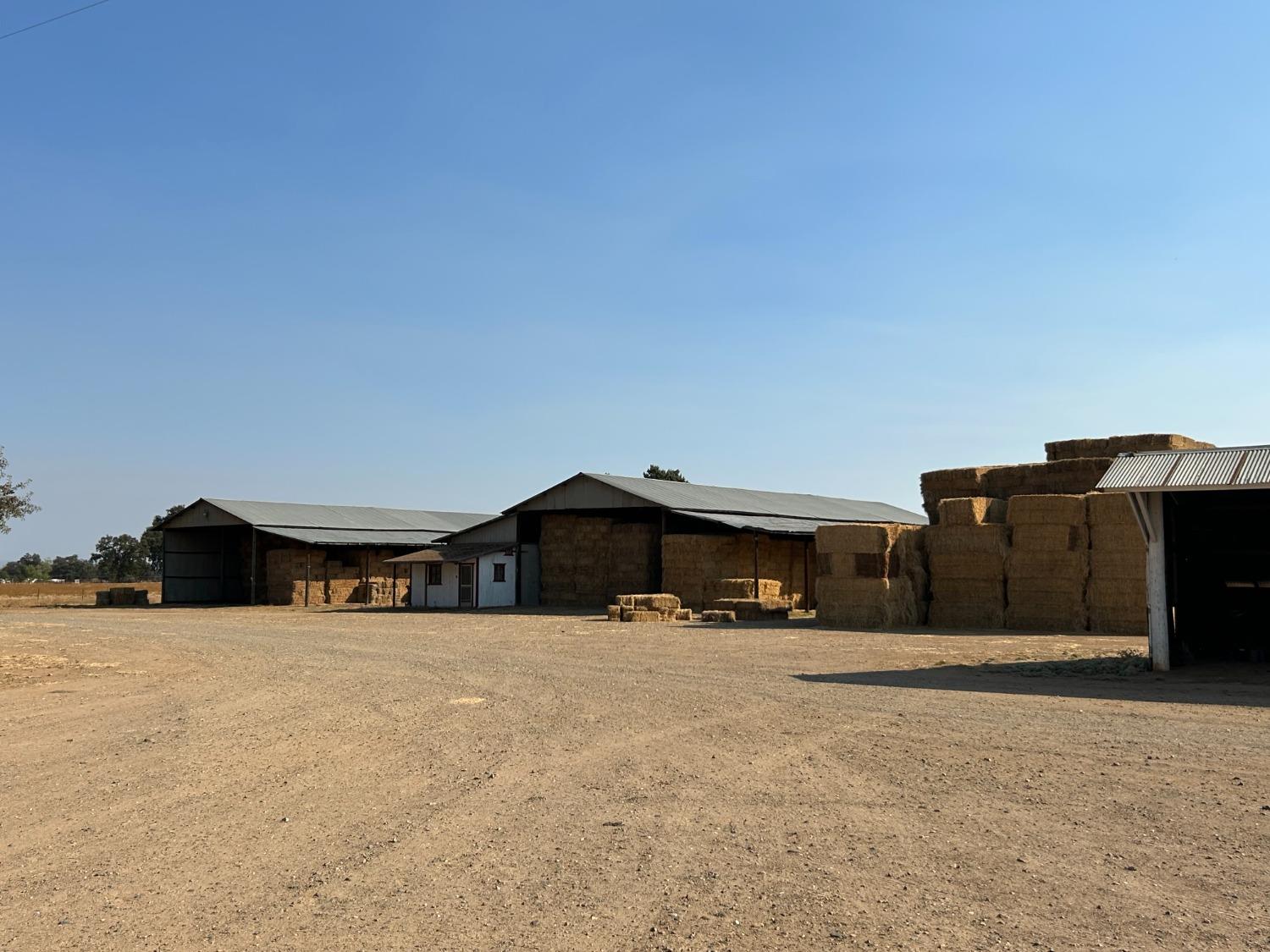 a view of a house with a snow in the yard