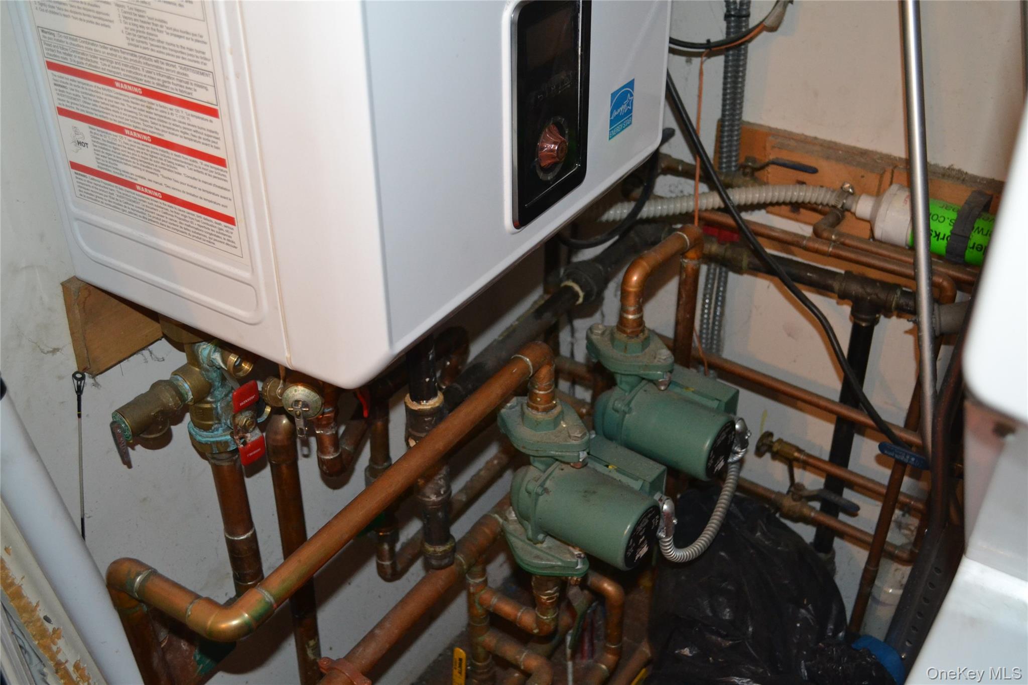 516 Long Beach Road Island Park, NY 11558 - Photo 16 of 31 main house wall hung heating unit