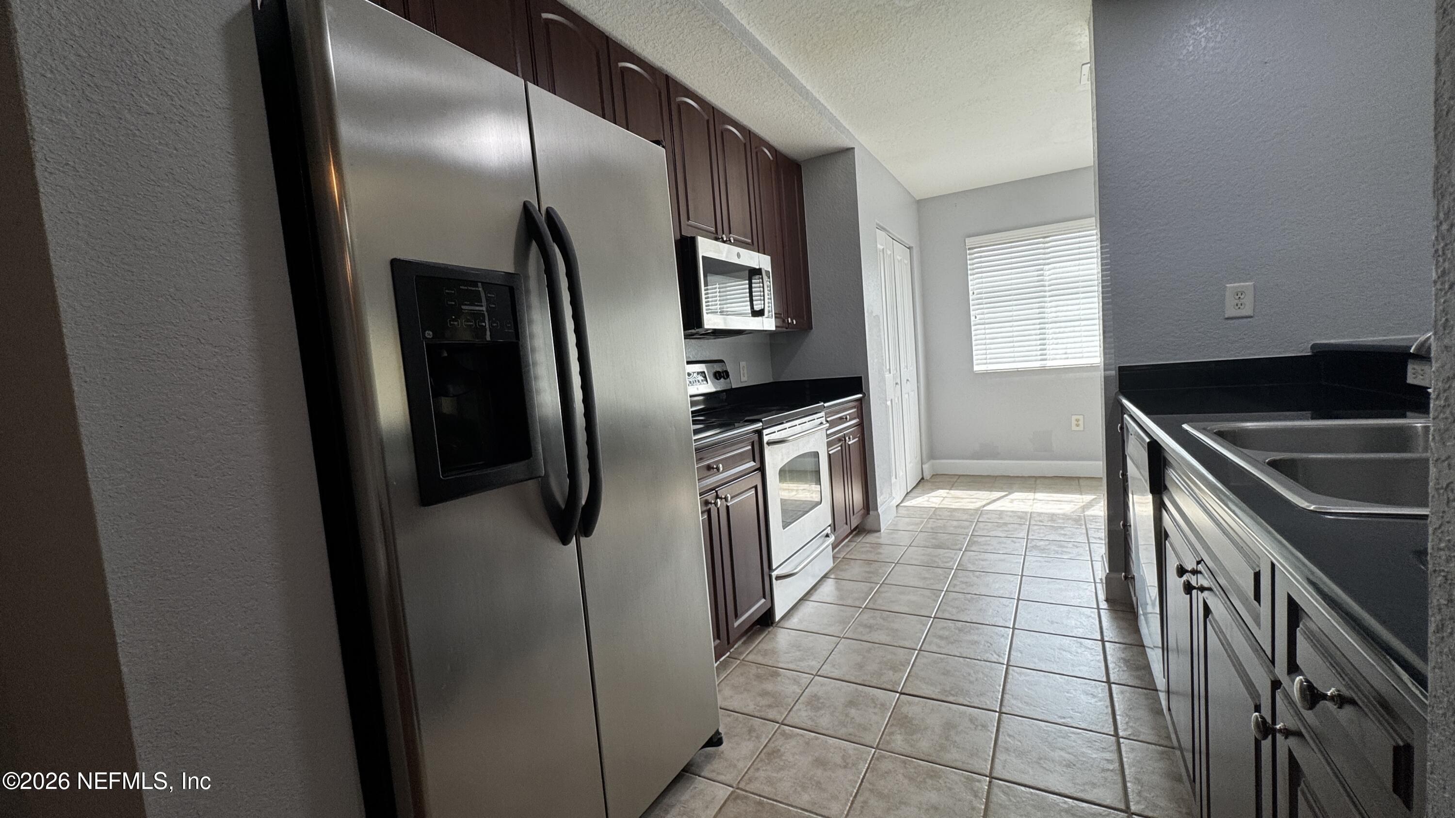 9745 Touchton Road, Unit 2904 Jacksonville, FL 32246 - Photo 7 of 33 IMG_3917