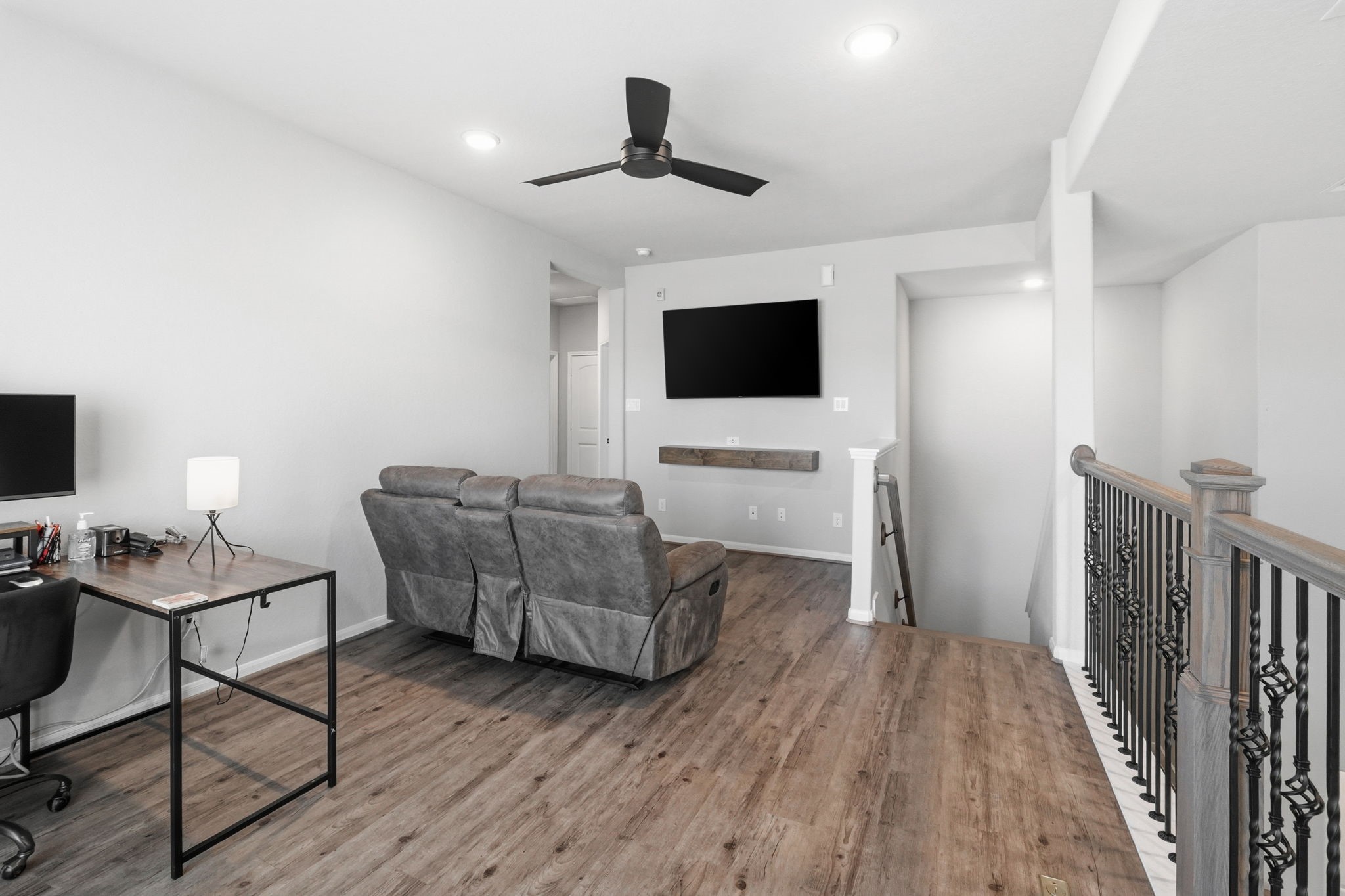 4334 Umber Shadow Drive Spring, TX 77386 - Photo 21 of 45 Game room features wood-look flooring, recessed lighting, a ceiling fan, and a versatile layout ideal for recreation, media, or a home office setup.