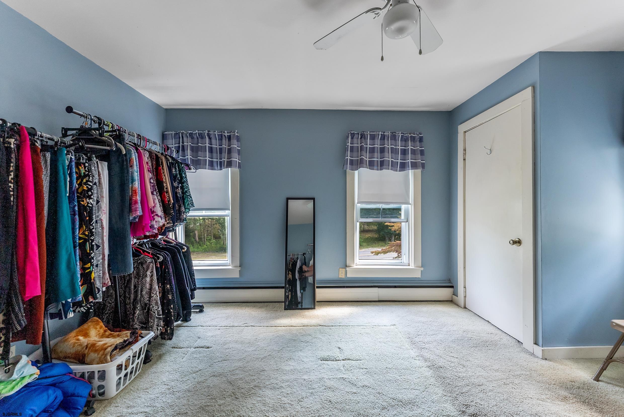 225 Chestnut Neck Road Port Republic, NJ 08241 - Photo 12 of 29 a view of a room with clothes and shoes
