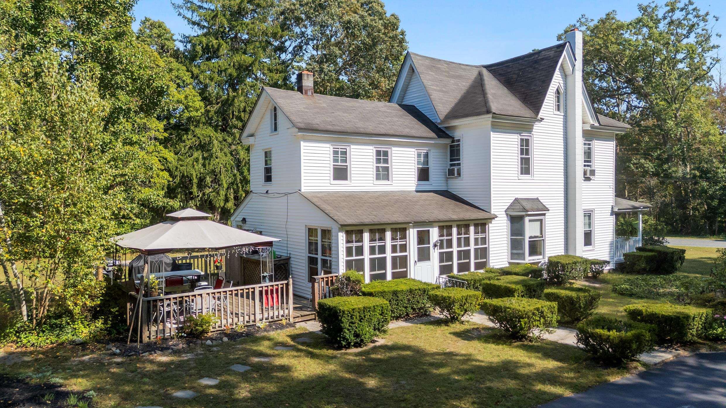 225 Chestnut Neck Road Port Republic, NJ 08241 - Photo 21 of 29 a aerial view of a house with swimming pool and garden